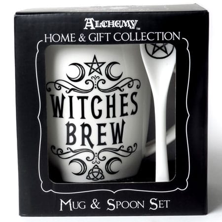 Front view of the gift box of the Witches Brew coffee mug and spoon set from Alchemy of England. The mug is white with black print and has a Pentagram on the spoon.