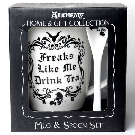 Front view of the gift coffee mug and spoon set from Alchemy of England's Home & Gift Collection. The mug is white with black design and lettering.