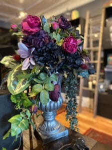 A floral display inside of the Vampfangs Salem Shop